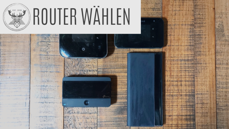 Eine Auswahl mobiler Router im Wohnmobil auf Holztisch